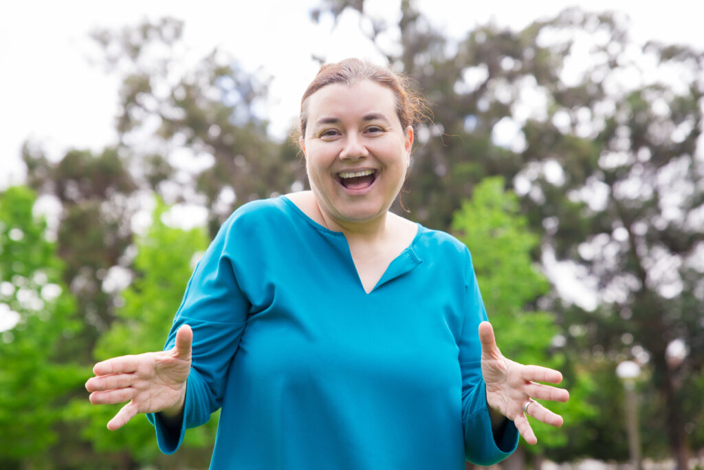 Woman smiling outdoors