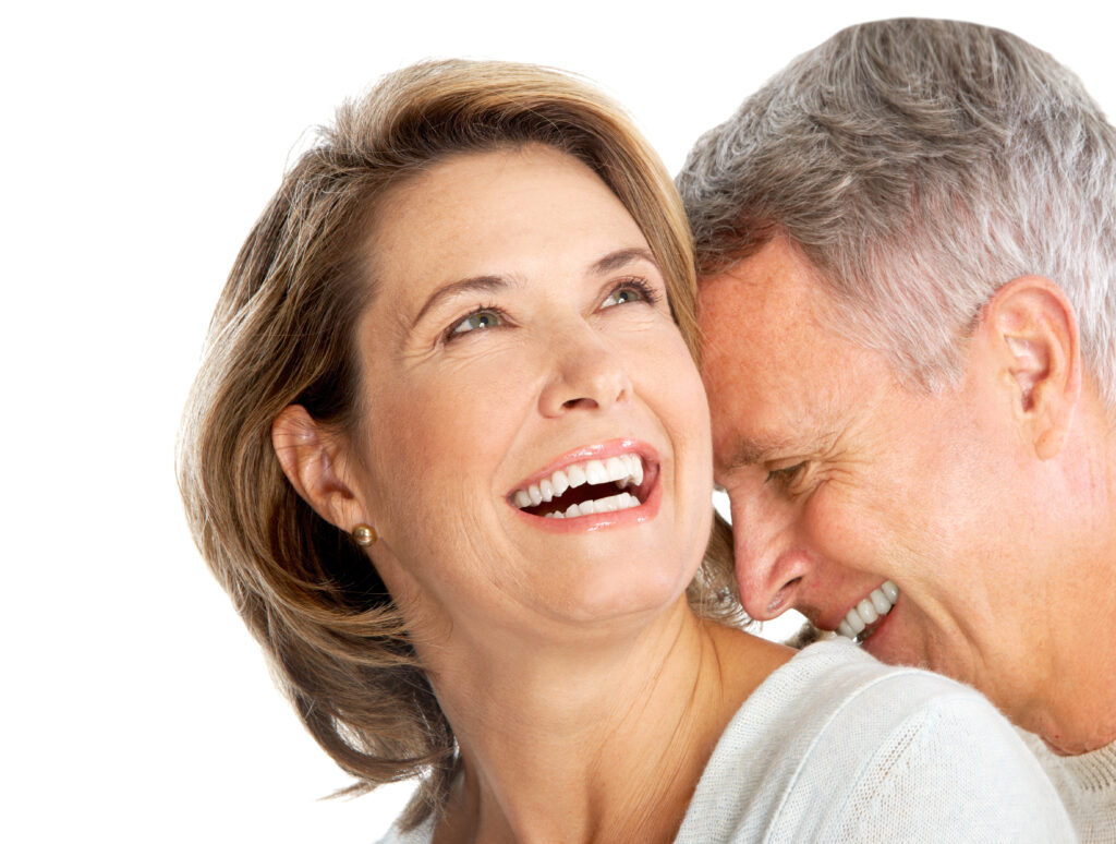 Smiling couple laughing together